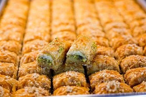 Flakey, buttery filo pastry layered with chopped nuts and cut into crispy squares
